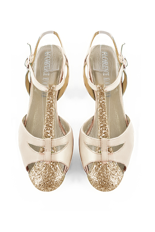 French elegance and refinement for these gold and champagne white dress open back T-strap shoes, 
                available in many subtle leather and colour combinations. This charming flat salomé will nicely replace a more conventional ballerina.
Absolute comfort and singularity for this favorite model !  
                Matching clutches for parties, ceremonies and weddings.   
                You can customize these shoes to perfectly match your tastes or needs, and have a unique model.  
                Choice of leathers, colours, knots and heels. 
                Wide range of materials and shades carefully chosen.  
                Rich collection of flat, low, mid and high heels.  
                Small and large shoe sizes - Florence KOOIJMAN